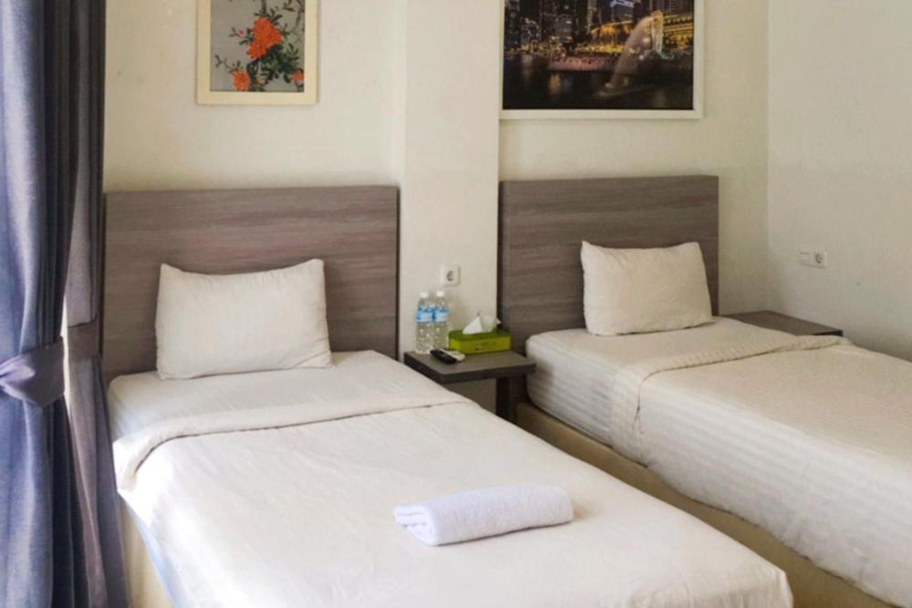 Twospaces Living At Maximus Inn ปาเลมบัง ภายนอก รูปภาพ